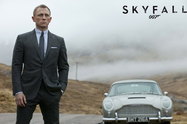 Film. Skyfall. A man with a car outdoors