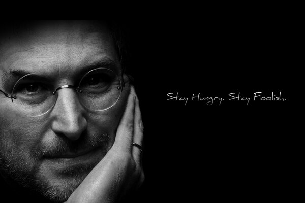 Steve Jobs on a black background