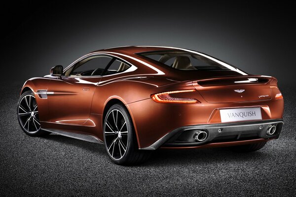 Aston martin car on a dark background