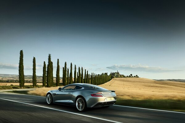 A car on the road with a beautiful landscape