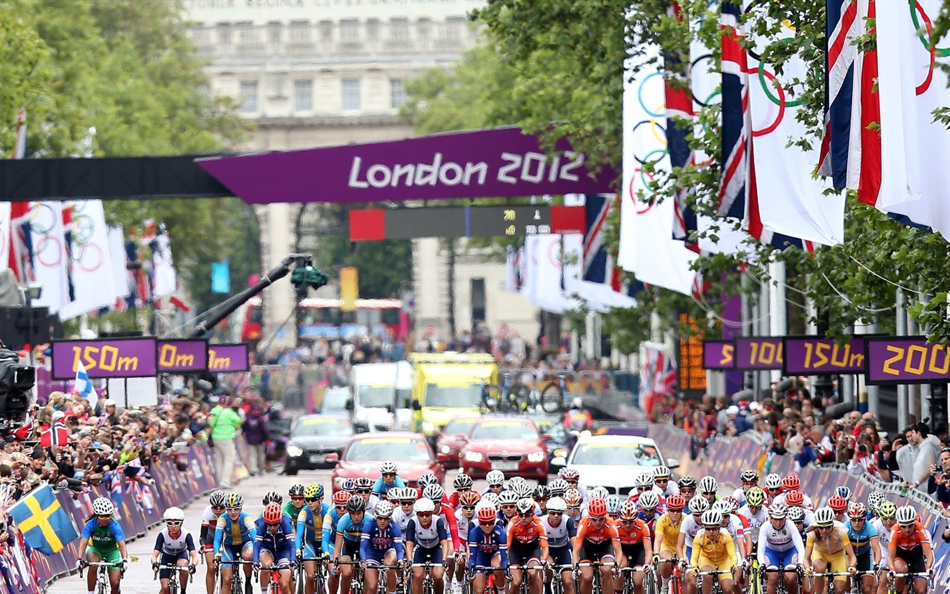 olympische spiele menge stadt viele straße festival parade wettbewerb flagge london olympische spiele athelete fahrrad