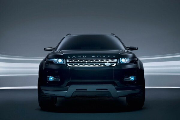 Черный land rover с ксеноновыми фарами