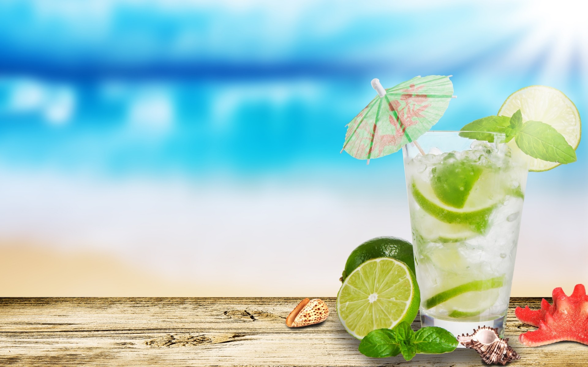 estate bere cocktail freddo tropicale vetro ghiaccio menta lime succo di frutta limone rinfrescante frutta liquido