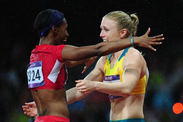 Sportswomen congratulate each other on the victory