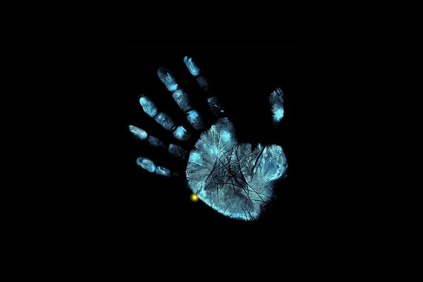 Blue hand on a black background