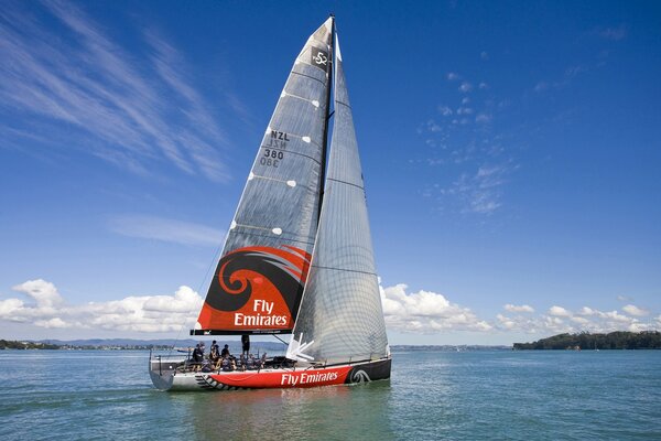 Sailboat among the open sea