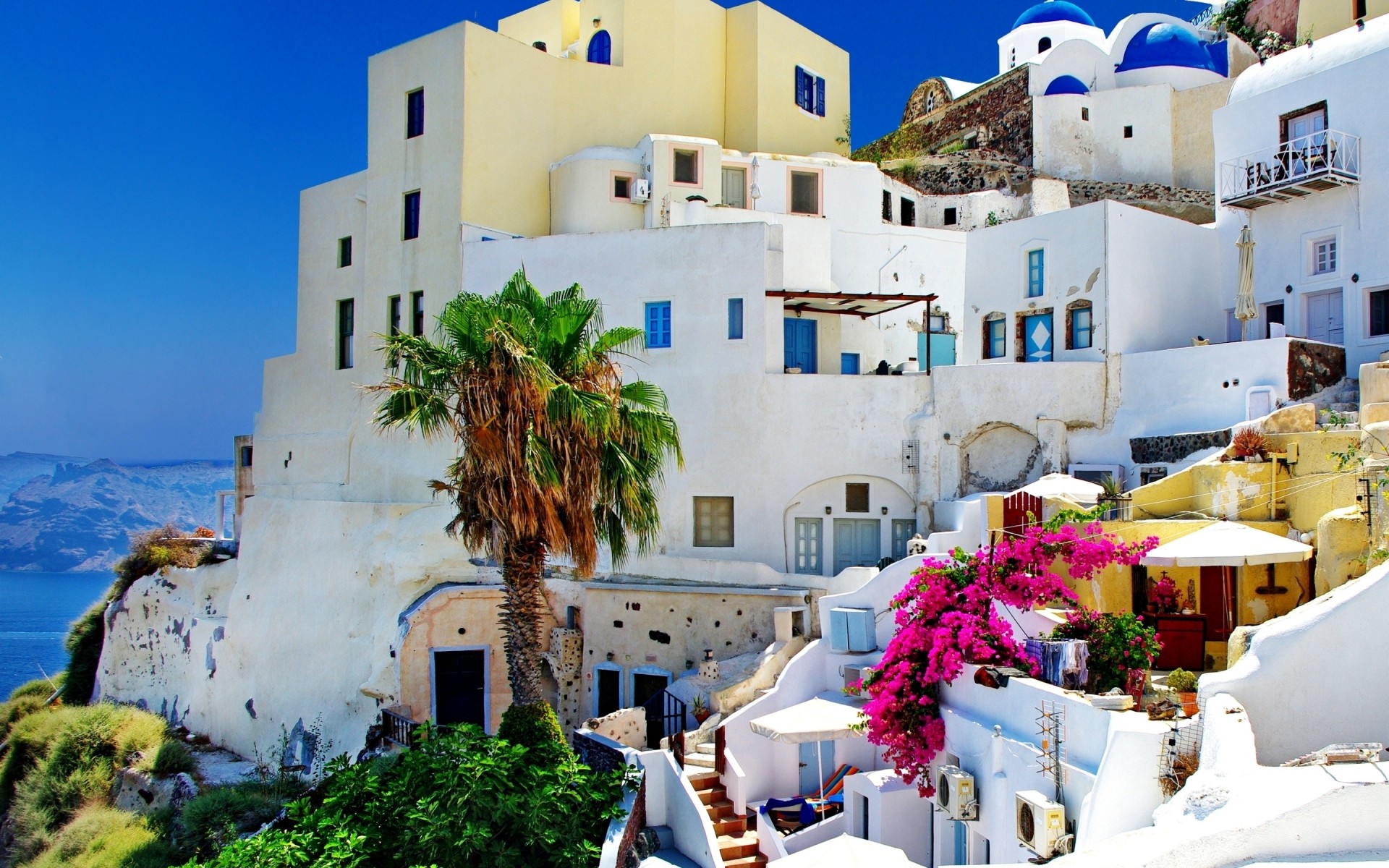 greece architecture travel house building outdoors town sky vacation tourism traditional family city summer sea seashore old sight palms santorini