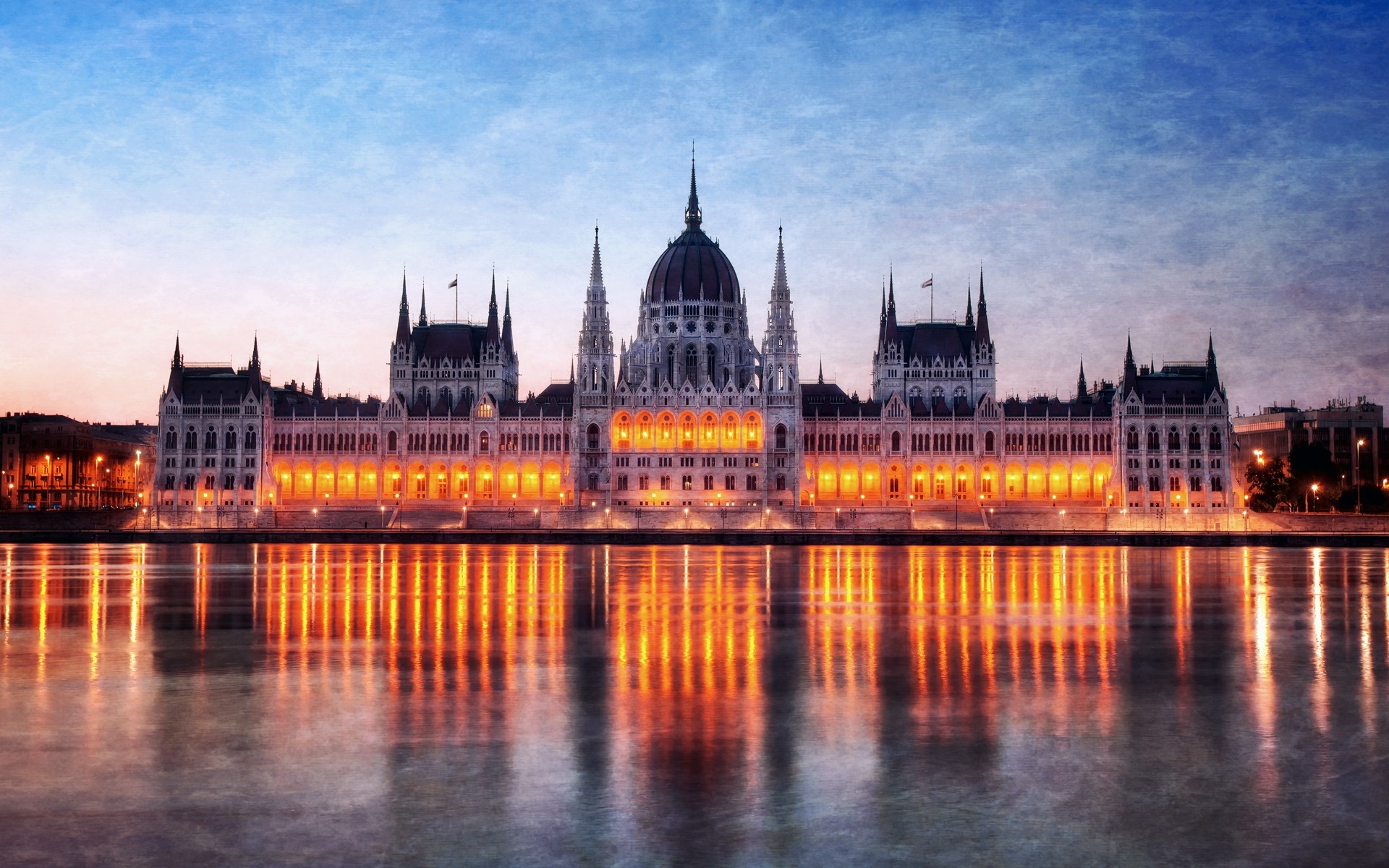 other city architecture river city travel water building dusk reflection sky sunset bridge evening cityscape tourism outdoors landmark lights landscape town