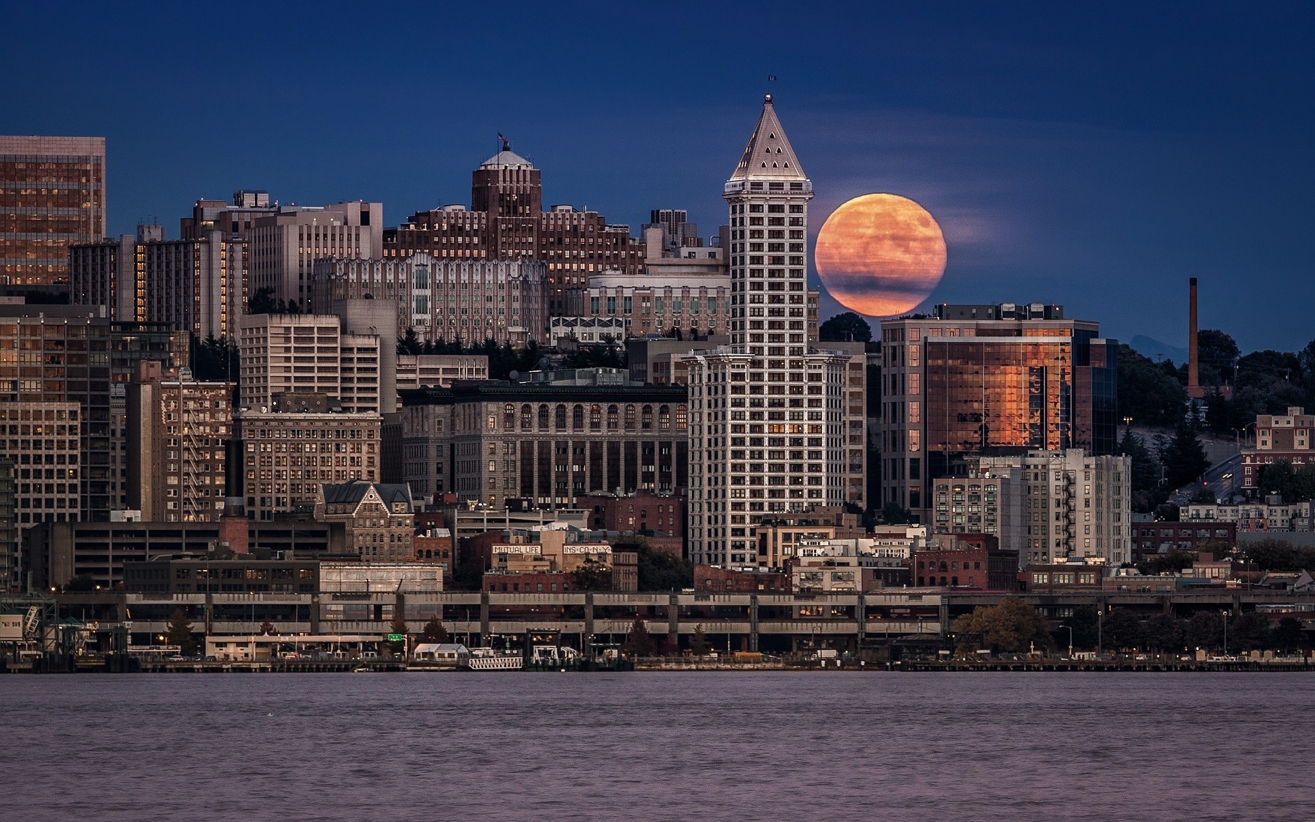 stany zjednoczone miasto skyline woda architektura miasto podróże dom wieżowiec port nabrzeże morze niebo centrum miejski rzeka molo zachód słońca domy księżyc usa