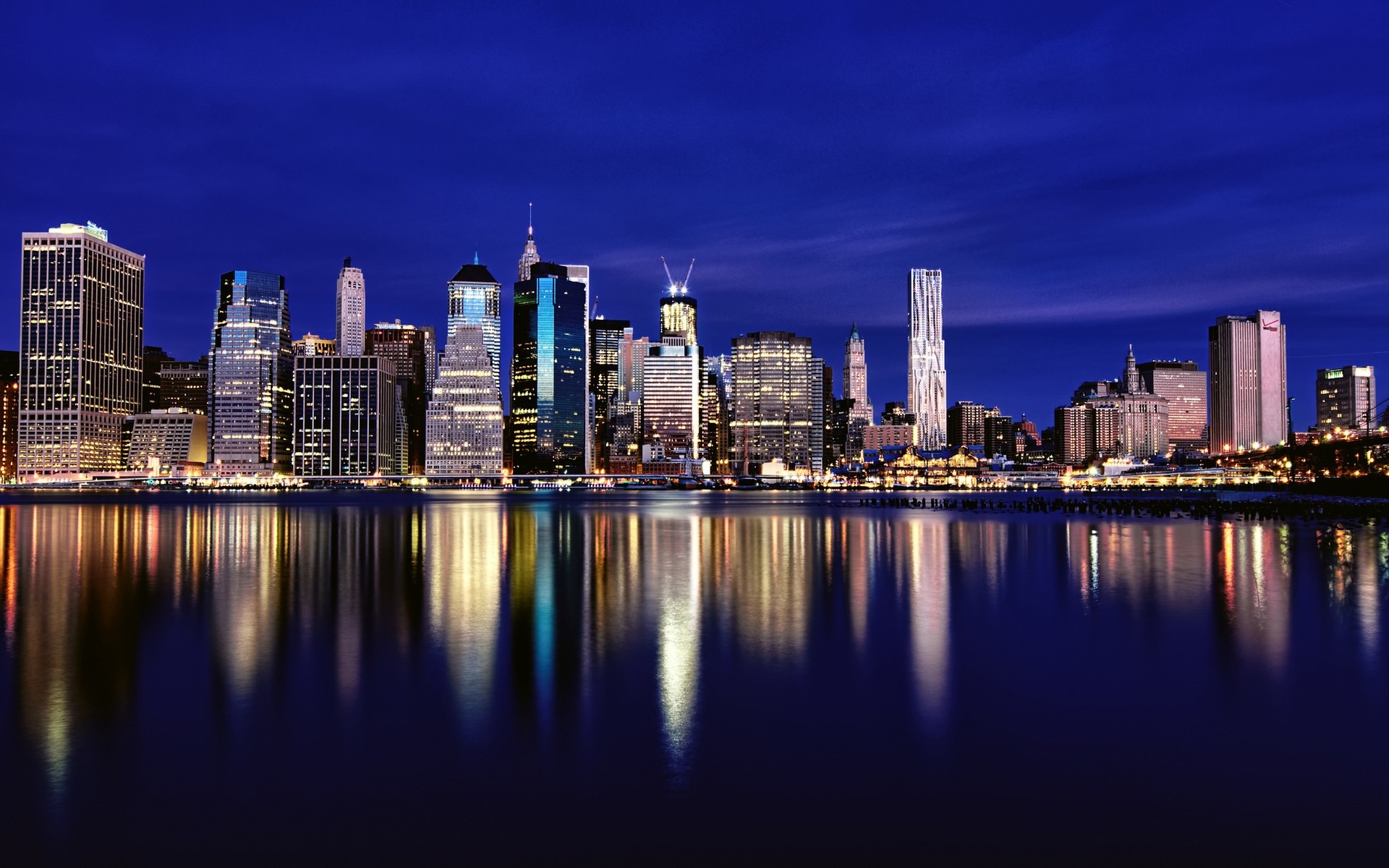 united states city skyline skyscraper cityscape architecture downtown office building dusk waterfront sky reflection water travel river urban modern business finance evening lake ny landscape new york background new york pics