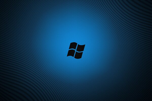 Логотип windows светится на синем фоне