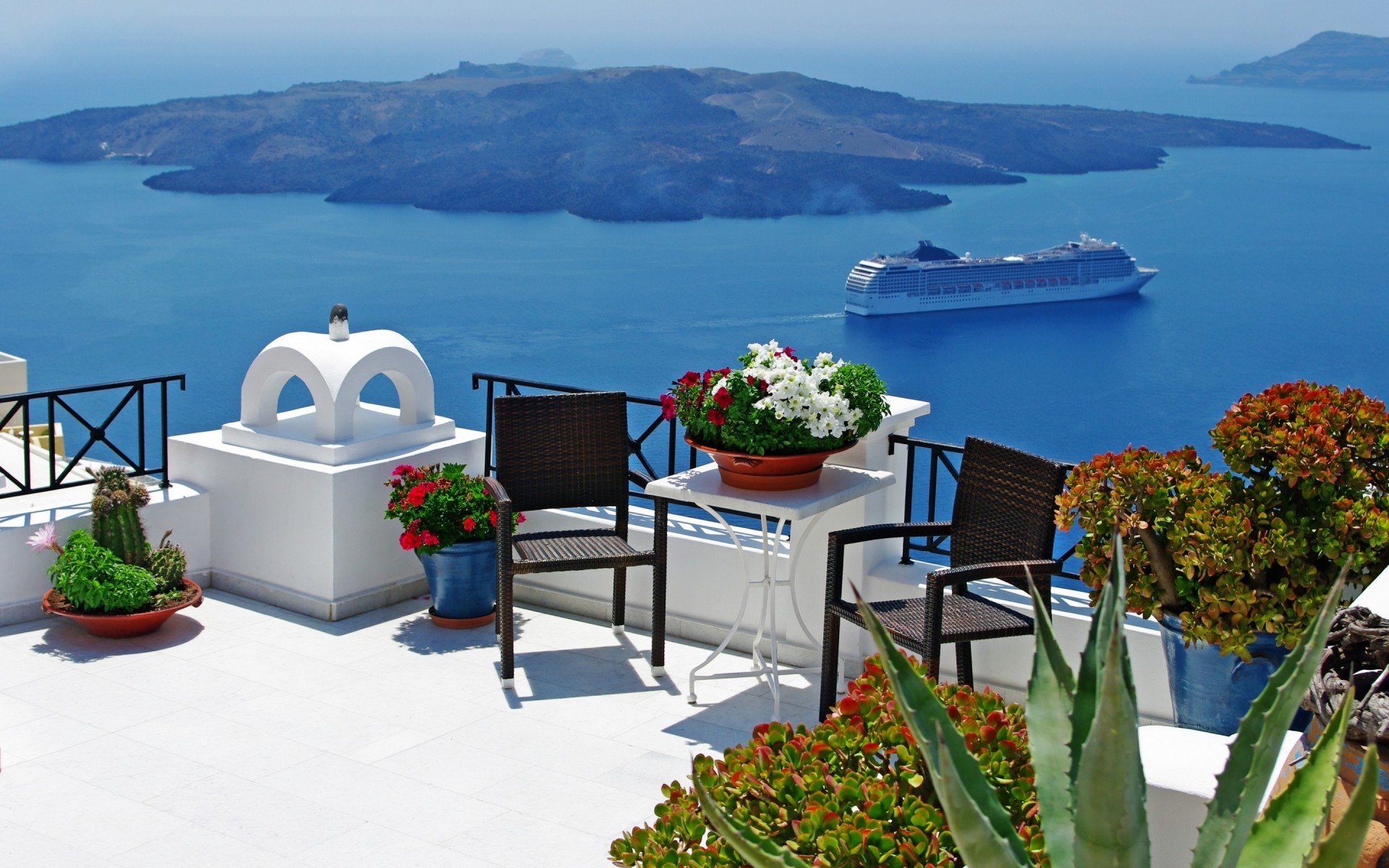 grèce voyage mer eau île mer chaise resort hôtel océan à l extérieur été plage architecture ciel vacances santorin photo photos de santorin santorin paysage