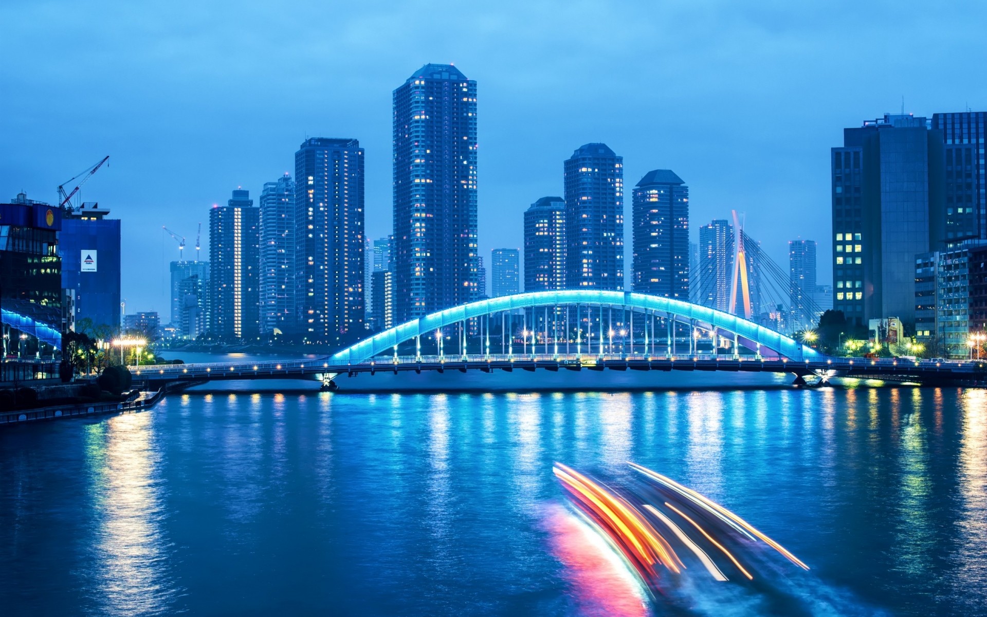 japan architecture downtown city skyscraper cityscape dusk skyline travel finance building water business waterfront sky office urban evening bridge illuminated skyscrapers night the bridge the river exposure light lights blue clouds