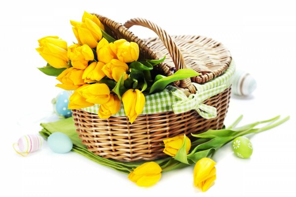 Easter basket with yellow tulips