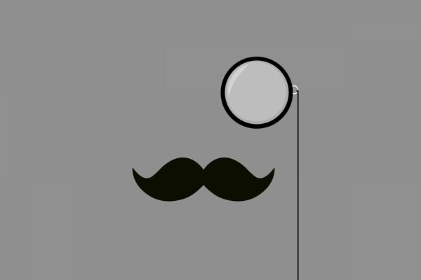 Black mustache and monocole on a gray background