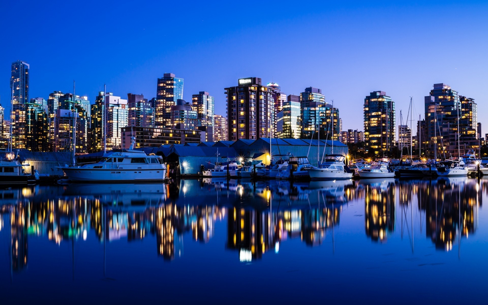 otras ciudades reflexión ciudad agua crepúsculo viajes arquitectura cielo noche ciudad puesta de sol casa puerto paseo marítimo moderno skyline urbano muelle negocio centro de la ciudad noche paisaje barcos luz