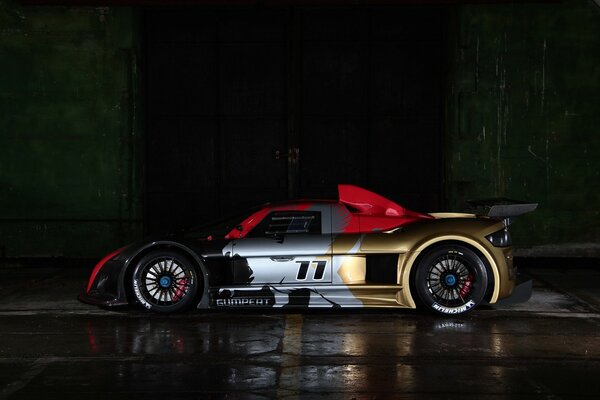 Sports car, reflection on wet asphalt