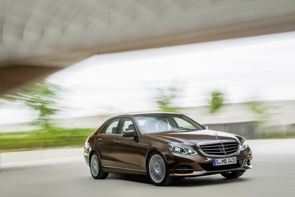 Brown Mercedes. Moving background