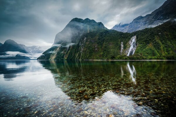 Green rocks on the water