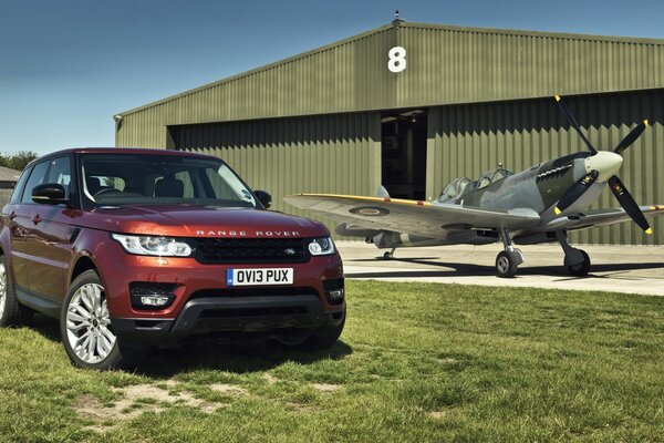 A range rover car and an airplane