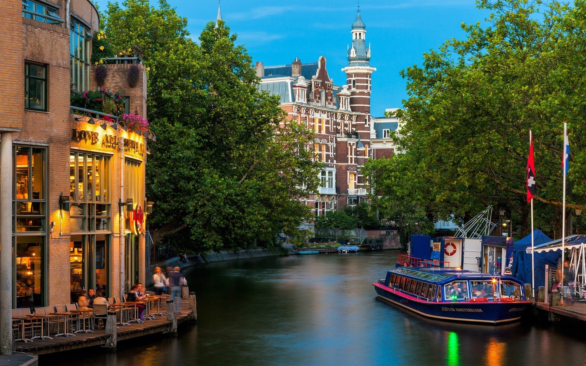 other city canal architecture travel water building city river outdoors tourism town reflection house boat bridge urban tourist street amsterdam