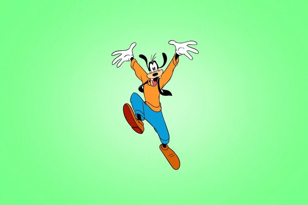 El perro Goofy corre alegremente