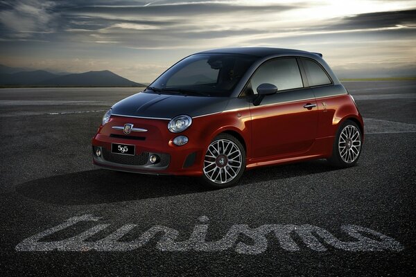 Fiat car on the black sidewalk