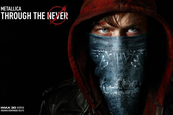 Masked and hooded man black background