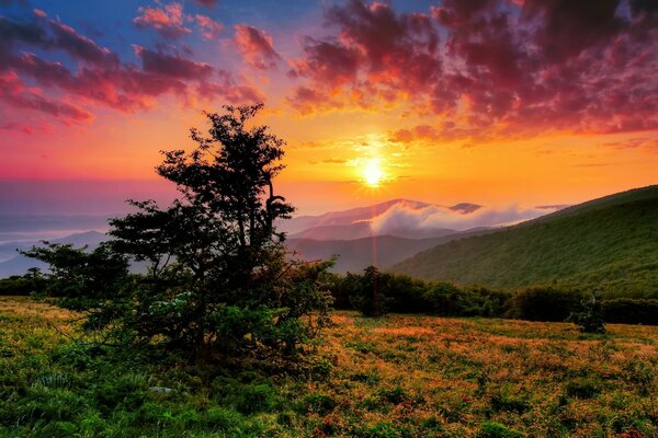 Sunset over the peaks of the mountains