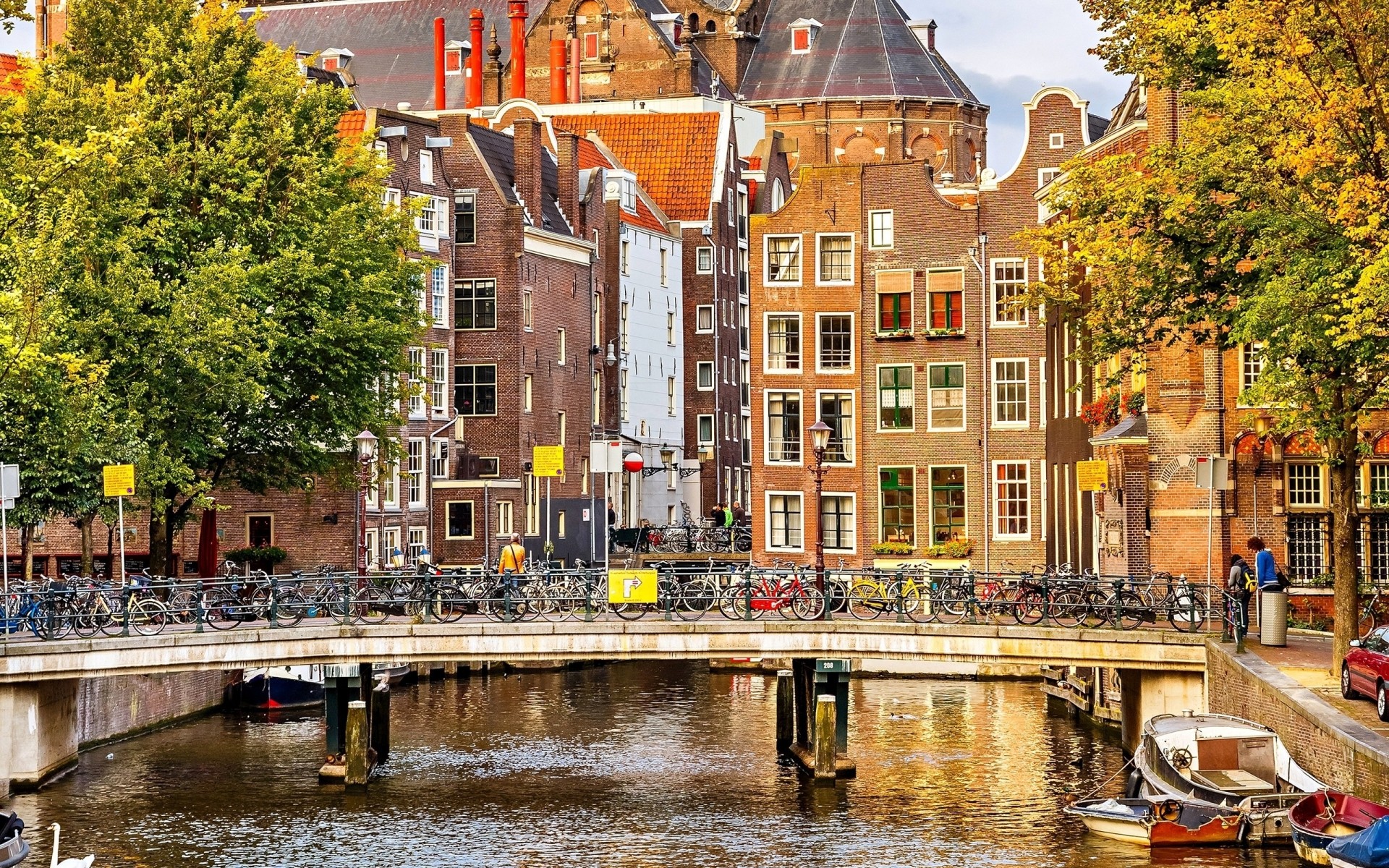 other city city building architecture travel water town river canal urban house tourism bridge street outdoors boat sight old cityscape sky amsterdam