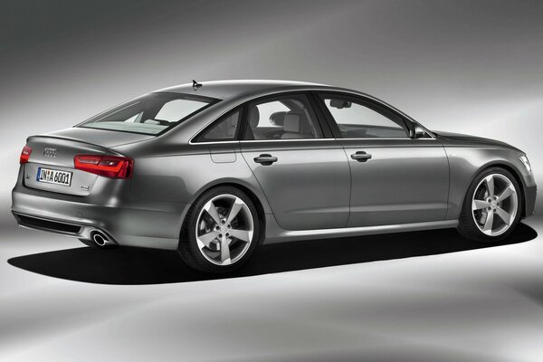 Silver Audi on a gray background