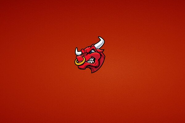 Картинка разьяренного бика на червоному тлі