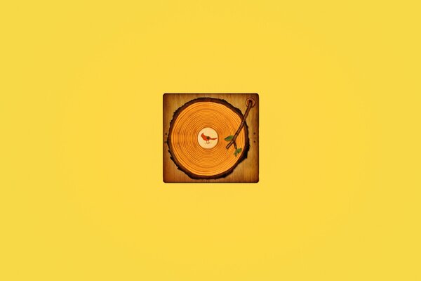 Wooden turntable and yellow background