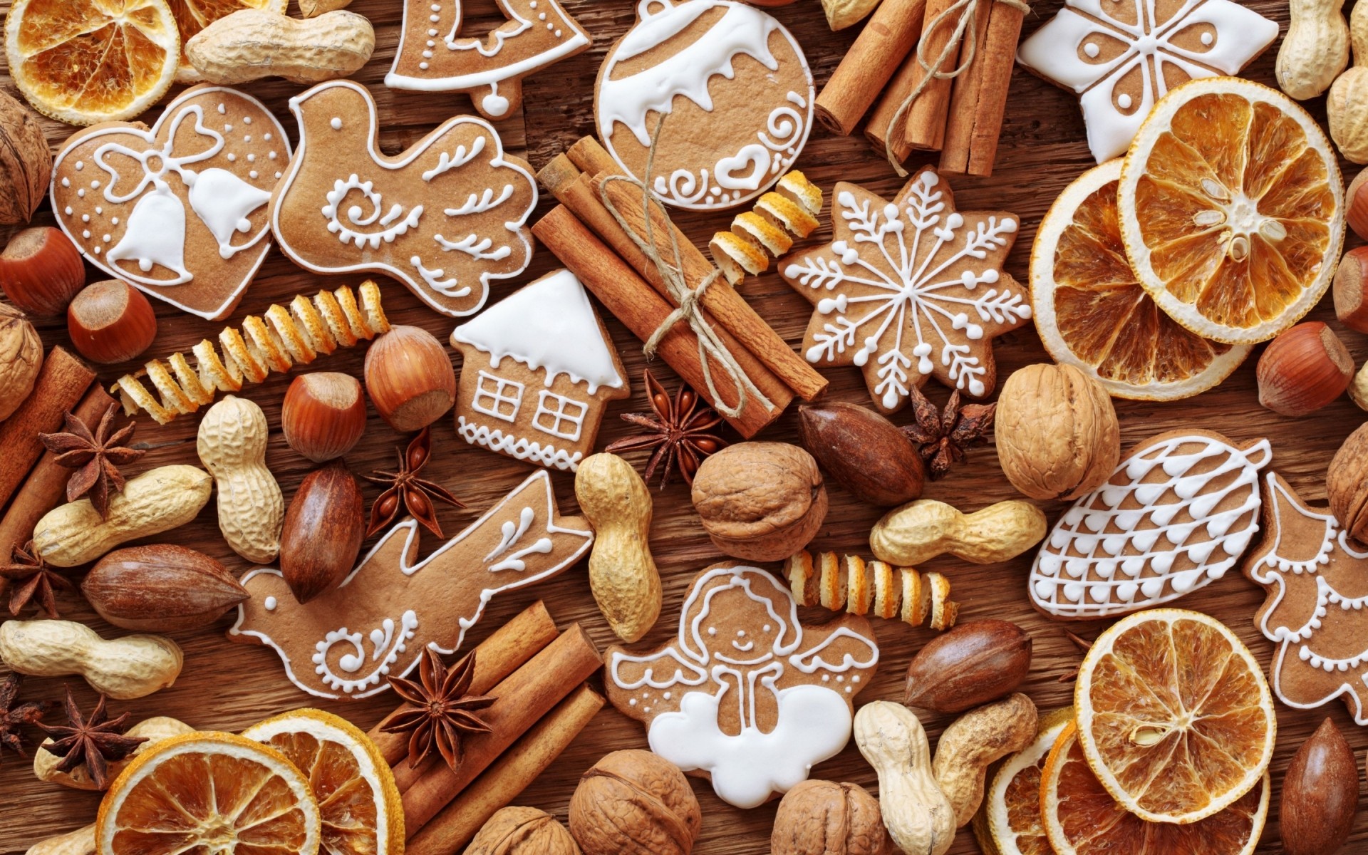 natale cannella cibo anice cioccolato dolce pasticceria caramelle zucchero spezie gingerbread man bastone biscotti desktop legno legno rinfresco aromatico scuro dolci biscotti decorazioni natalizie