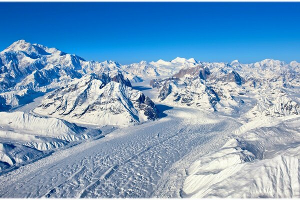 The road among the snows in the mountains