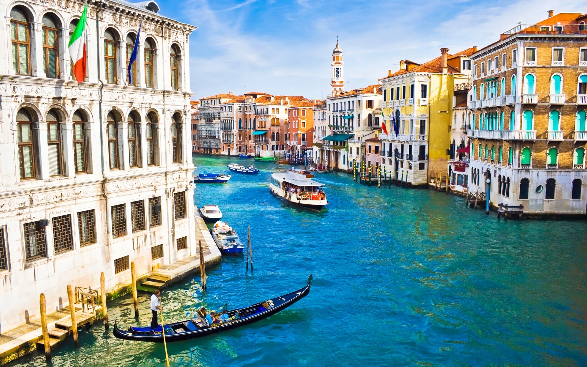 italy venetian gondola travel water architecture tourism vacation canal gondolier building city boat sight sea tourist lagoon sky grand transmit landmark river ship venice sunshine landscape