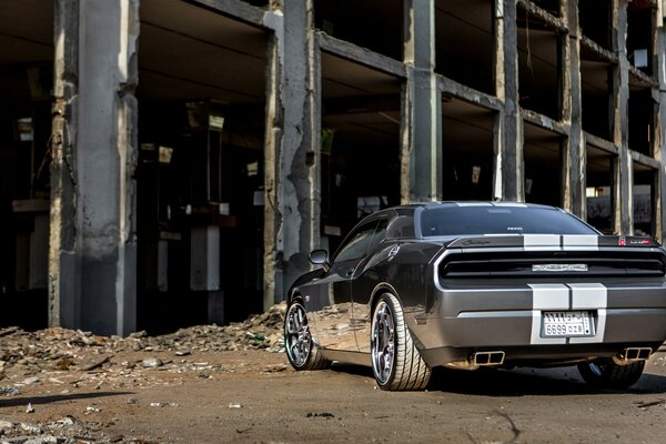 Luxury car on an abandoned construction site