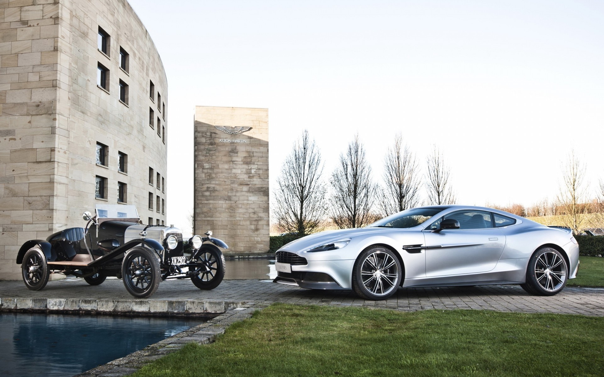 aston martin car vehicle wheel transportation system drive road pavement automotive asphalt old aston martin classic aston martin vintage aston martin vanquish aston martin vanquish