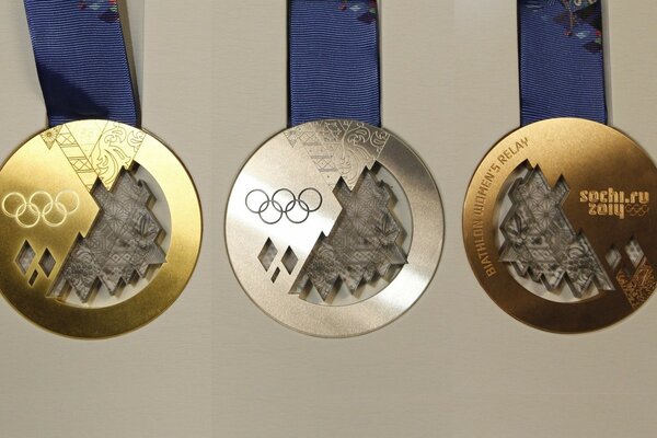 Imagen de tres medallas olímpicas