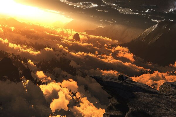 Clouds above the ground in sunlight