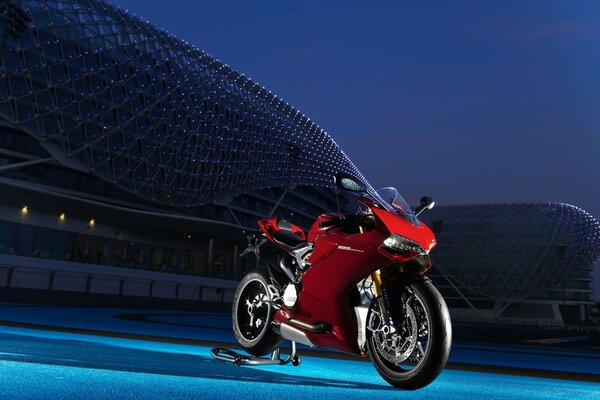 Red Ducati motorcycle in the arena