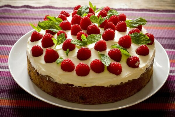 Delicious dessert with red raspberries