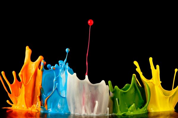 Splashes of paint on a black background