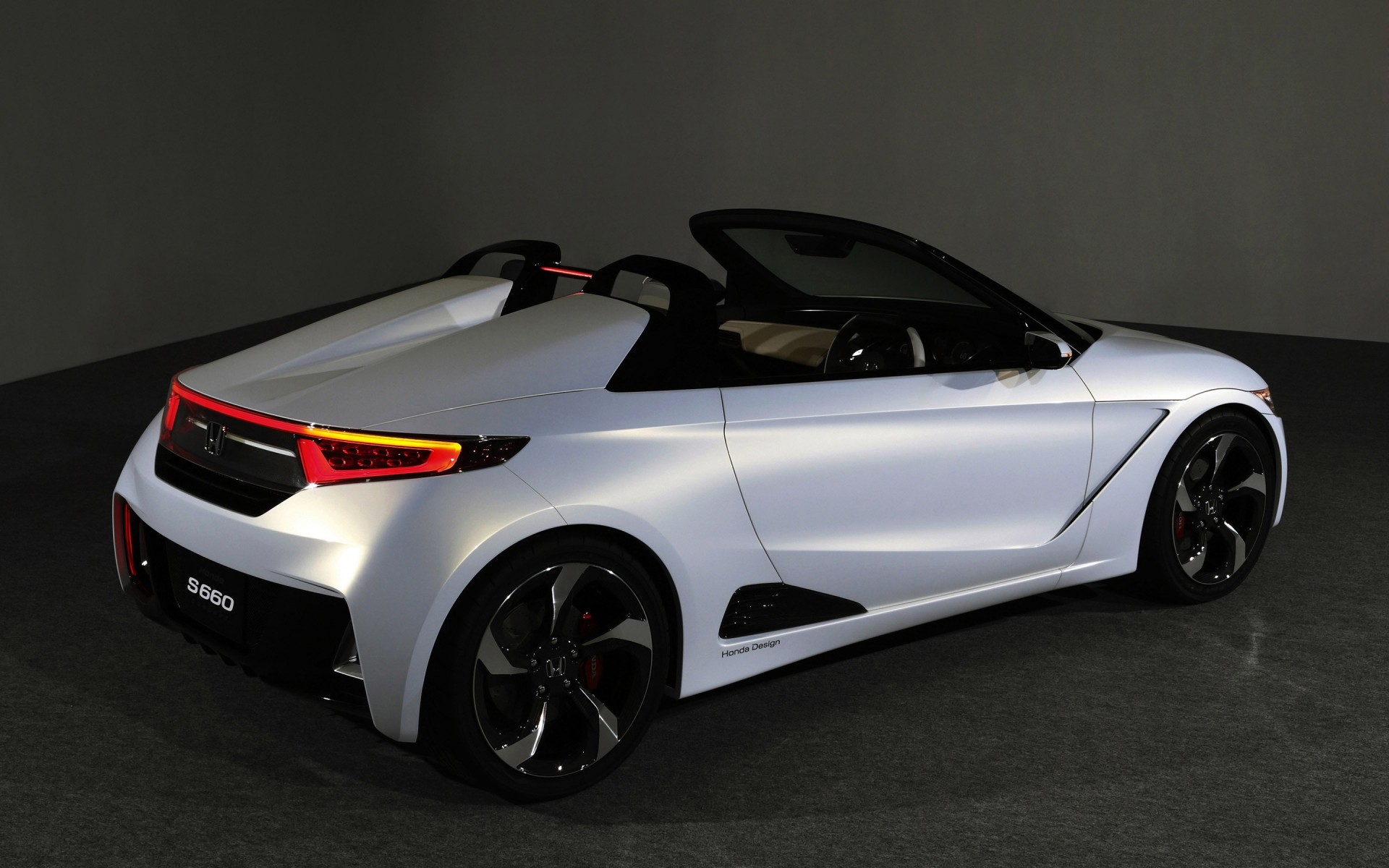 concept cars car vehicle coupe automotive wheel fast show transportation system blacktop prototype sedan hood drive hurry asphalt pavement roadster convertible exhibition noon honda concept