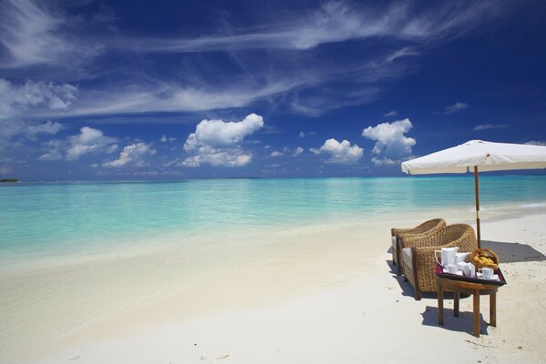 Snow-white beach and blue sea