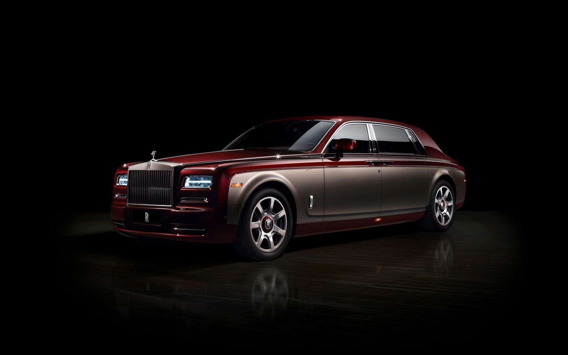 rolls royce автомобіль автомобіль автомобільна чорнушка колеса полудень седан транспортна система купе поспішайте тротуар швидко асфальт лімузин розкішні автомобілі чудовий круто