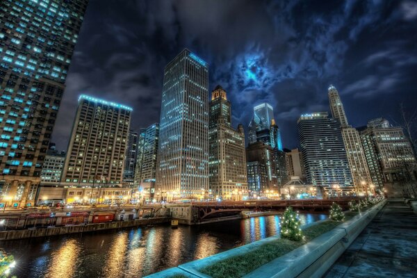 Night city. Reflection of lights in the water