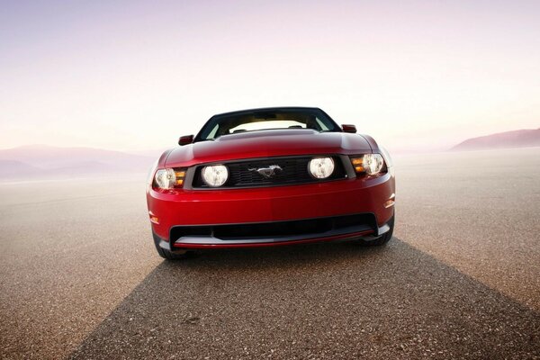 Red sports car in the desert