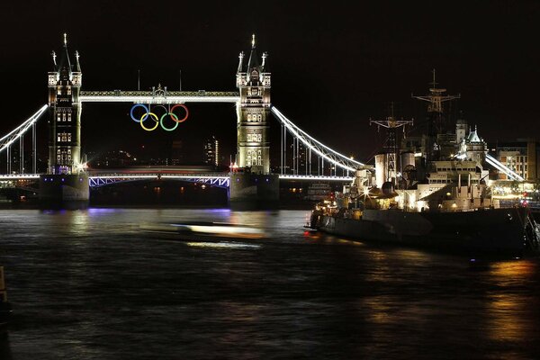 Olympic rings on the background of the bridge