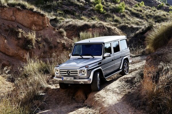 Medredes off-road. Gray car in the hills